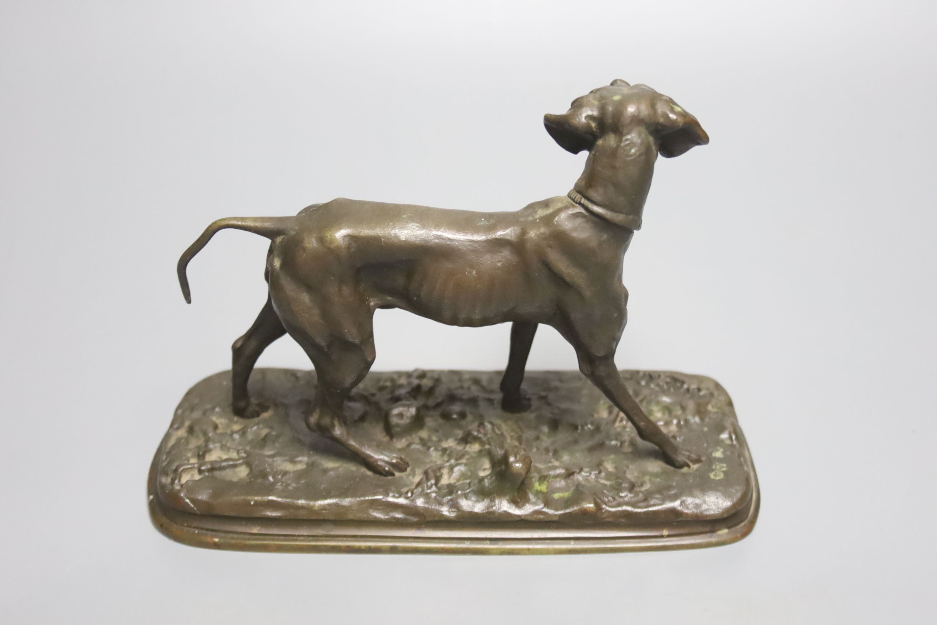 After P. J. Mene, a bronze model of a pointer, signed, on oval naturalistic base, length 19cm